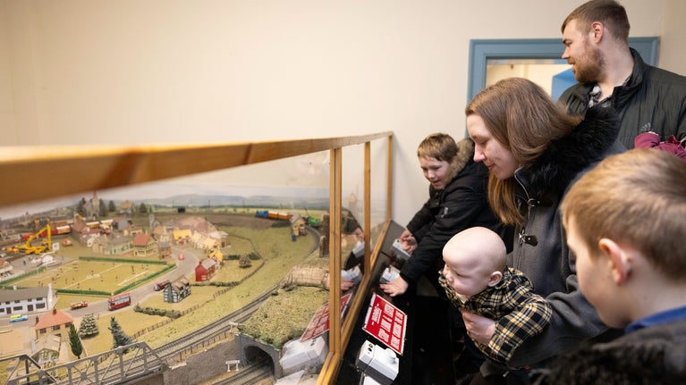 Family enjoying the Thomas the Tank Engine railway layout at Ormesby Hall